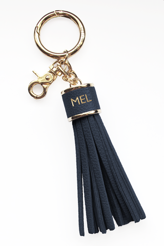 The Mel Boteri Pebbled-Leather Tassel Charm | Denim Blue Leather With Gold Hardware | Mel Boteri Gift Ideas