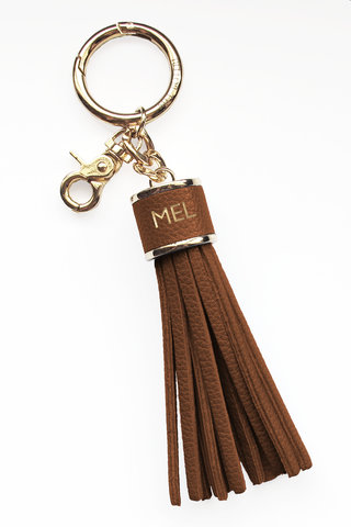 The Mel Boteri Pebbled-Leather Tassel Charm | Oak Leather With Gold Hardware | Mel Boteri Gift Ideas